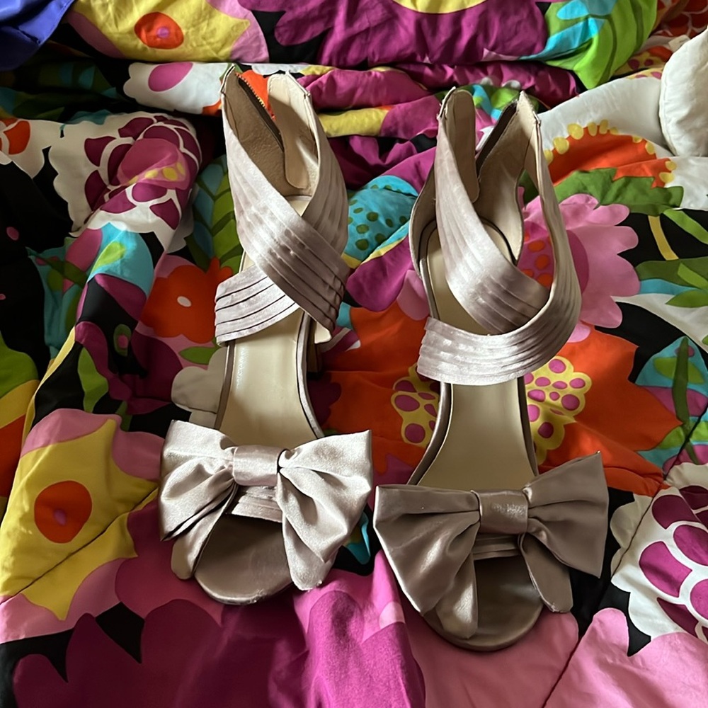 Tan strappy heels with detachable bow